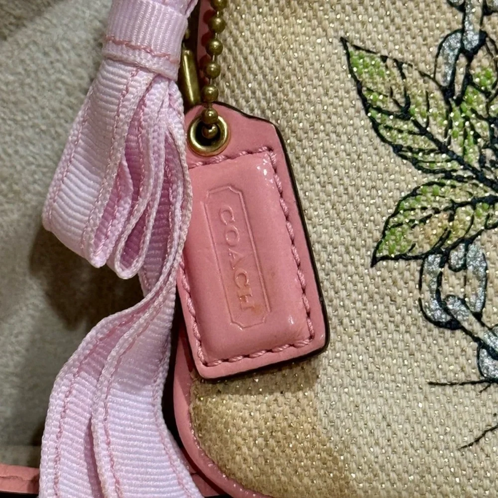 Limited Edition Coach Floral Canvas Wristlet Leather Trim and Bow
Charm - Picture 4 of 9